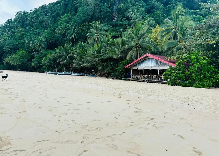 White Beach Front And Cottages